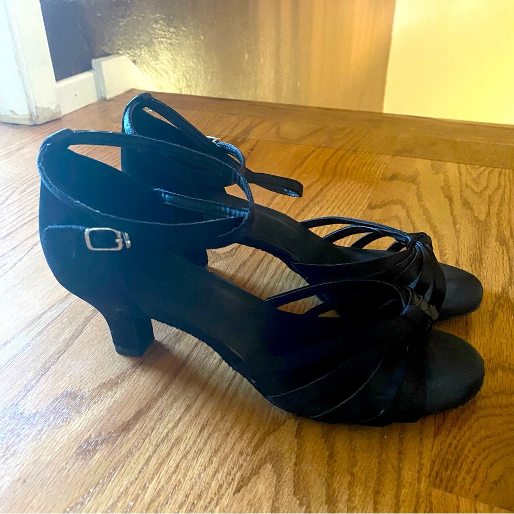 1 1/2 inch heels. Black Salsa dance heels. Only were worn twice.